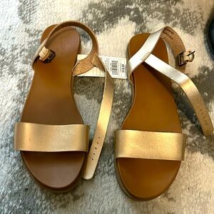 New. Never worn. Sandals.